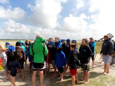 a group of people standing in a circle