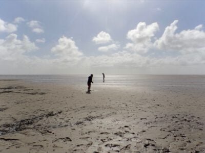 a group of people on a beach