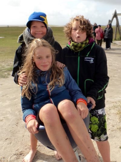 a group of kids posing for a picture