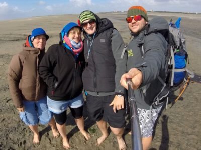 a group of people taking a selfie