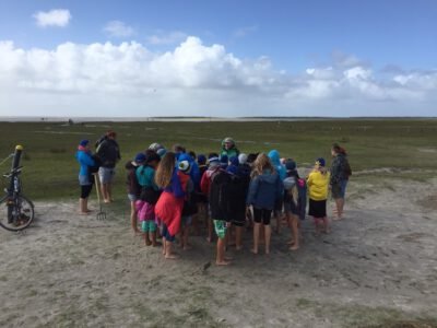 a group of people standing in a circle