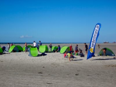 a group of people on a beach