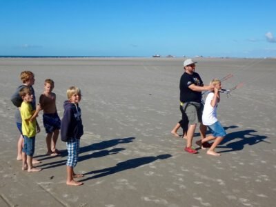 a group of people on a beach
