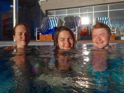 a group of girls in a pool