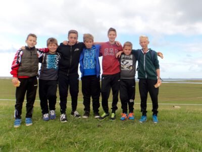 a group of boys posing for a picture