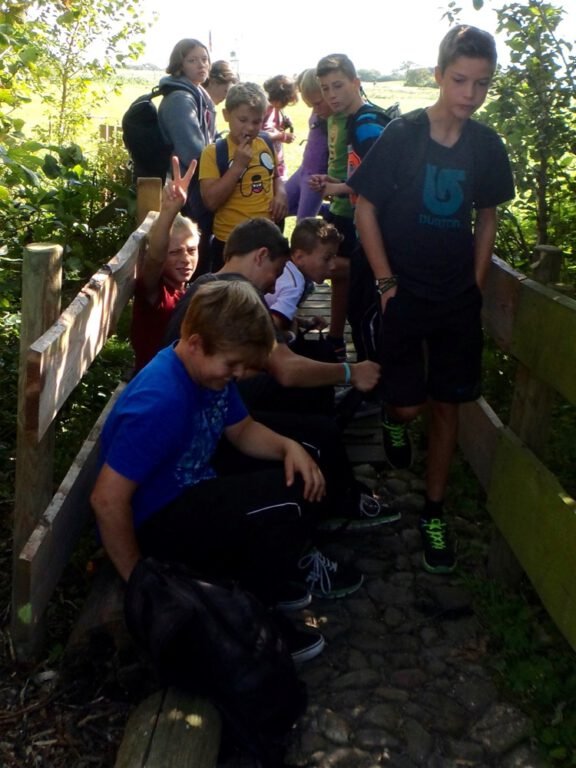 a group of people on a bridge