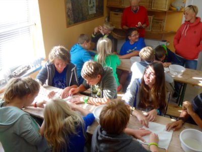a group of people sitting at tables