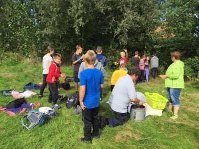 a group of people outside in a field