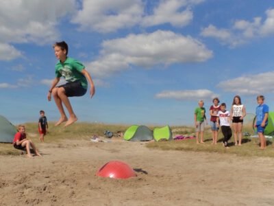 a boy jumping in the air