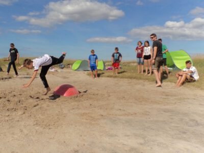 a group of people playing with a ball