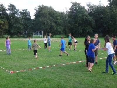 a group of kids on a field